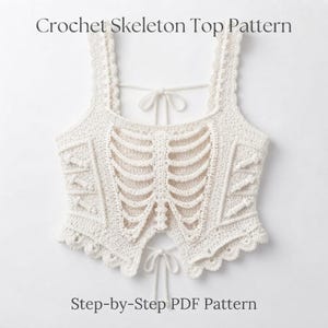 May include: A cream-colored crochet top featuring a rib cage skeleton design on the front, with scalloped edges, shoulder straps, and tie closures at the neck and waist. The text reads: Crochet Skeleton Top Pattern Step-by-Step PDF Pattern.