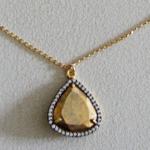 Pyrite Faceted Heart Shaped Gold Bezel CZ Rimmed Necklace.