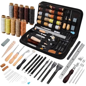 May include: A comprehensive leather crafting tool kit featuring a black zippered storage case, various spools of colored waxed thread, metal stitching chisels, wooden handle awls, a metal ruler, needles, and specialized cutting and burnishing implements.