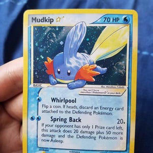 Cosmos Holo) Pokemon Card Gold Star Team Rocket Returns Mudkip 107/109