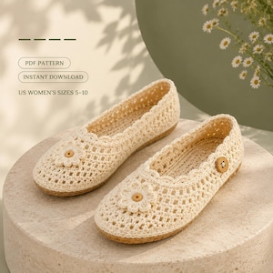 May include: A pair of cream-colored crochet flats featuring a scalloped edge, a daisy-shaped embellishment on the toe, and a small wooden button on the side. The text reads PDF PATTERN, INSTANT DOWNLOAD, and US WOMEN'S SIZES 5-10.