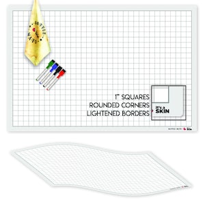May include: A white dry-erase battle mat with a 1-inch grid, rounded corners, and lightened borders. The mat is flat and has a slight sheen. The text "it's a SKIN" is printed in the bottom right corner.