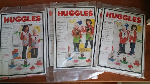 5 Huggles All purpose smocks with pocket, two Hopp