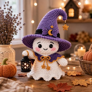 May include: A white crocheted ghost figurine wearing a purple pointed hat with a black band, a yellow crescent moon, and a star charm. The ghost has pink cheeks, a purple cape with yellow star accents, and holds a small black lantern.