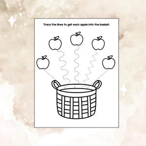 Può includere: Un foglio di attività stampabile in bianco e nero con cinque mele delineate sopra un cesto intrecciato. Il testo in alto recita Trace the lines to get each apple into the basket. Linee tratteggiate collegano ogni mela al cesto.