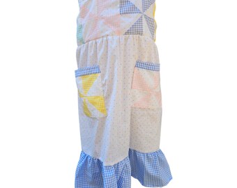 Child's pinwheel quilted square sundress with pockets