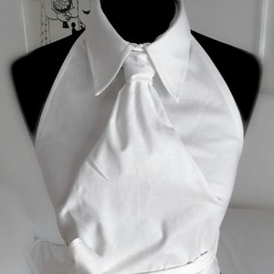 May include: A white halter top with a large collar and a bow tie. The top is made of a soft, lightweight fabric and is perfect for a summer day. The text "FedRaDD on Etsy" is visible in the bottom right corner of the image.