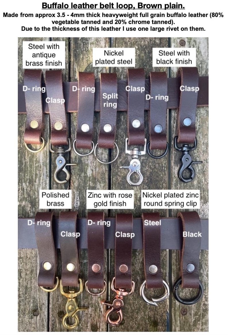 May include: A collection of brown buffalo leather belt loops featuring various metal hardware attachments including D-rings, clasps, split rings, and spring clips in finishes such as antique brass, nickel, black, polished brass, and rose gold.