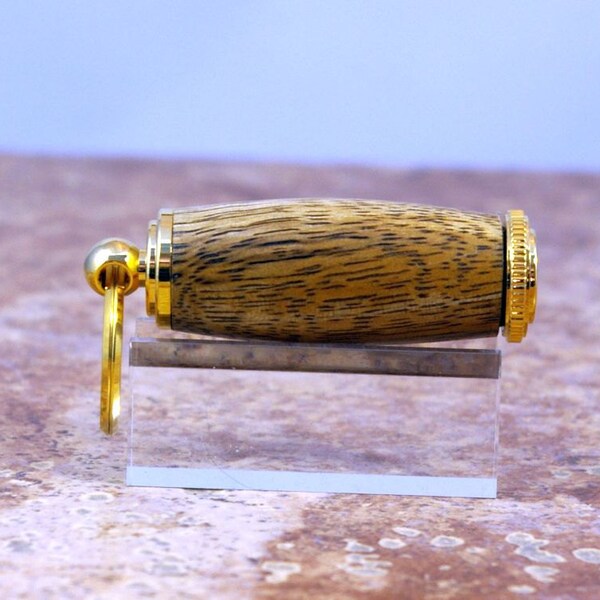 Hand turned Gold finish, Mango body Pill container/key ring