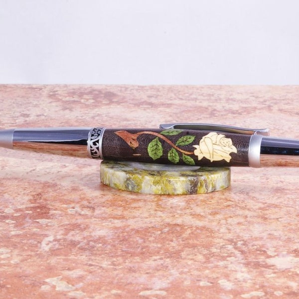 Hand turned Elegant Beauty Sierra twist pen with Inlayed White Rose.