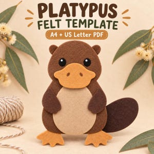 Puede incluir: Una plantilla de fieltro de un ornitorrinco en tonos marrón y beige con el texto PLATYPUS FELT TEMPLATE A4 + US Letter PDF. El ornitorrinco tiene un cuerpo marrón oscuro, una barriga beige claro y un pico y patas de color amarillo anaranjado.