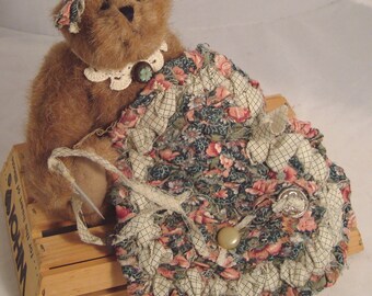 Decorative Plush Bear Working on Handcrafted Heart-Shaped Rag Rug