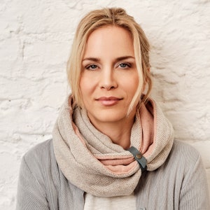 Infinity scarf - mocha pattern and blush pink, accessorized with a leather band