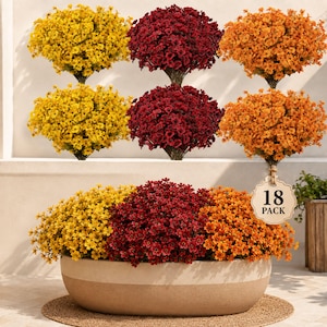May include: An 18 pack of artificial flower bushes in yellow, deep red, and orange. The set includes nine individual bushes arranged in a grid above a large, oval, two-toned beige planter filled with a dense, mixed-color floral arrangement.