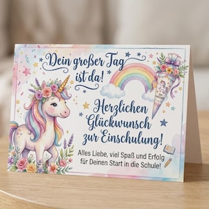 Puede incluir: Una tarjeta de felicitación rectangular con un unicornio en tonos pastel con una corona de flores, un arcoíris y un cono escolar. El texto dice: Dein großer Tag ist da! Herzlichen Glückwunsch zur Einschulung! Alles Liebe, viel Spaß und Erfolg für Deinen Start in die Schule!