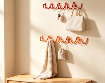 Modern vågig väggkrok, handgjord järnklädkrok, minimalistisk entrédekor, vågig metallvägghängare, kreativ klädkrok