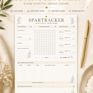Könnte beinhalten: Ein weißer A4-Spartracker zum Ausdrucken mit goldenem Text und botanischen Akzenten. Das Dokument enthält Bereiche für Sparziele, Fortschrittskreise, Meilensteine, Einzahlungslisten und Notizen mit dem Titel SPARTRACKER.
