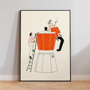 May include: A framed wall art print featuring a large orange and white moka pot. One figure climbs a black ladder leaning against the pot, while another figure sits on top, holding a steaming cup. The illustration uses black outlines on a cream background.