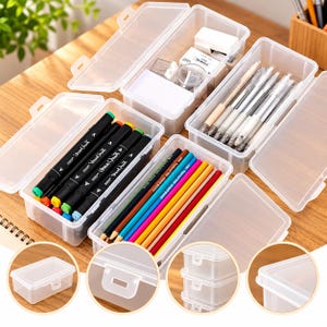 May include: Three clear plastic rectangular storage boxes with hinged lids. One box contains black markers, another holds colored pencils, and the third contains pens and small office supplies. Circular insets show the empty box, the latch, and stacked boxes.