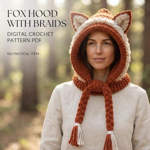 May include: A crochet fox hood featuring pointed ears, a rust-orange and cream color scheme, and two long braided tassels with cream-colored fringe ends. The text reads: FOX HOOD WITH BRAIDS, DIGITAL CROCHET PATTERN PDF, NO PHYSICAL ITEM.