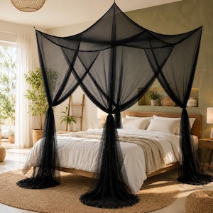 May include: A black four-poster bed canopy made of sheer, fine-mesh netting. The canopy features a square top frame with four panels of fabric that drape down to the floor, creating a tent-like structure over the bed frame and mattress.