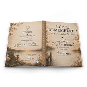 May include: A book titled Love Remembered: Letters to My Husband by Janeen, featuring a sepia-toned landscape of a lake, a wooden chair, and a dock. The cover includes text about continuing conversations and the Wandering Widow Comfort Company.