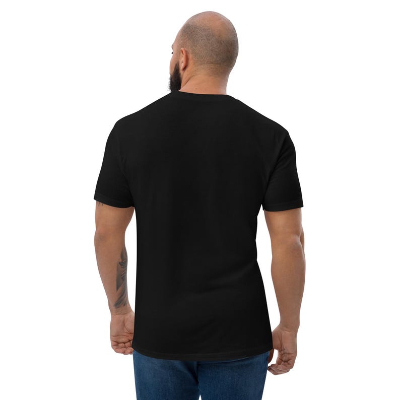 Coffee First, Bark Later Rottweiler t-shirt folded flat