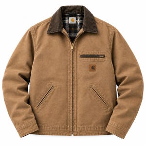 May include: A tan canvas jacket featuring a dark brown corduroy collar, a full-length front zip, and two lower slanted pockets. The chest includes a small zipped pocket and a Carhartt brand patch. The interior is lined with a plaid fabric.