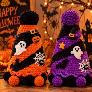 May include: Two cone-shaped crochet decorations for Halloween. One is orange and black with a black pom-pom on top, featuring a ghost, spider web, spider, pumpkin, and bat. The other is purple and black with a purple pom-pom, featuring a ghost, spider web, spider, bat, star, and witch hat.