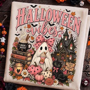 May include: A cream-colored fabric featuring a graphic print with the text HALLOWEEN vibes. The design includes a ghost with a pink bow, a black cat, a haunted house, stacked books labeled POTIONS SPELLS MAGIC, a mug labeled BASIC WITCH, and pumpkins.