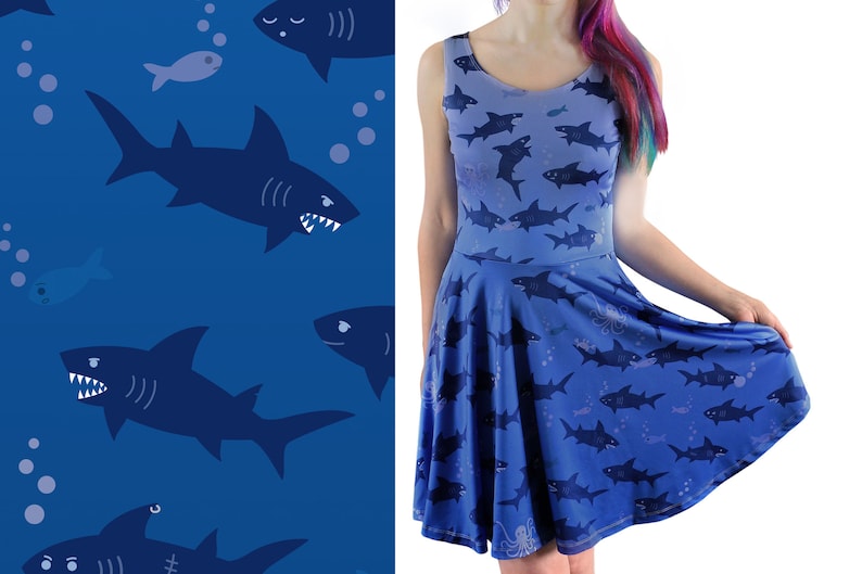 Sleeveless skater dress (just above knee length) in blue with a pattern of sharks.