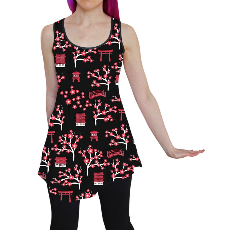 May include: A black sleeveless dress with a white and red print of cherry blossoms, pagodas, and torii gates.