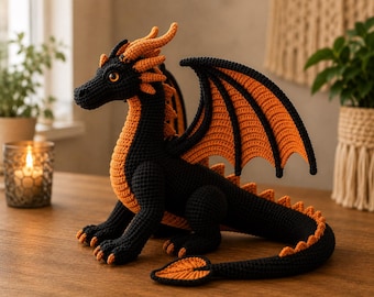 May include: A crocheted dragon figurine featuring a black body with vibrant orange accents on the wings, chest, tail spikes, and head crest. The creature has a long tail, four legs with claws, and large, detailed wings, all crafted with yarn.