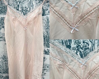 Vintage 1960s peachy slip dress with lace and bows