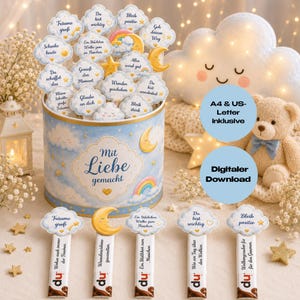 May include: A cylindrical container decorated with clouds, stars, and a rainbow, featuring the text "Mit Liebe gemacht." It holds multiple cloud-shaped sticks with German phrases and stars. Five chocolate bars with cloud toppers are arranged in front.