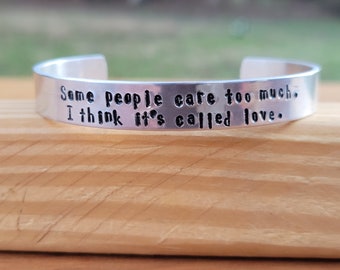 Winnie the Pooh -  Some people care too much. I think it's called love. - 3/8 inch wide metal stamped cuff bracelet