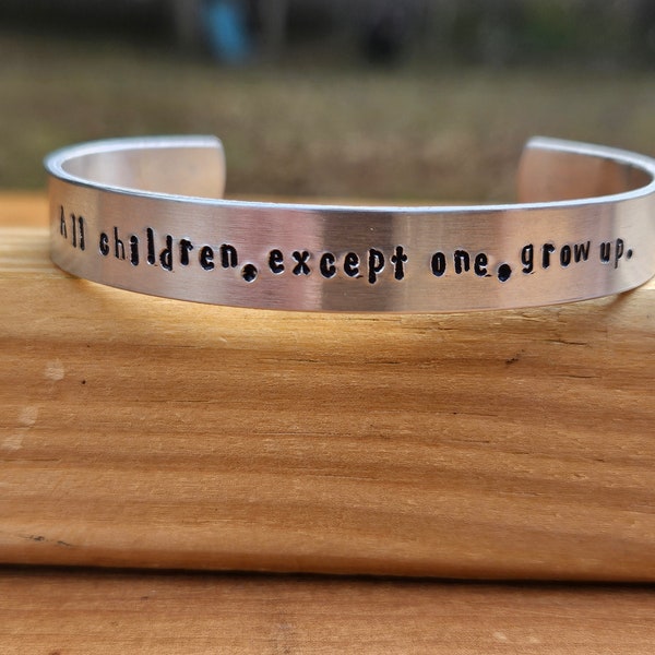 Peter Pan - JM Barrie  "All children, except one, grow up" Metal stamped quote cuff Bracelet