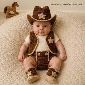 May include: A crochet newborn photo prop set featuring a dark brown cowboy hat with a beige star, a matching dark brown vest with a beige star, dark brown diaper cover shorts with two beige buttons, and dark brown booties with beige stars.