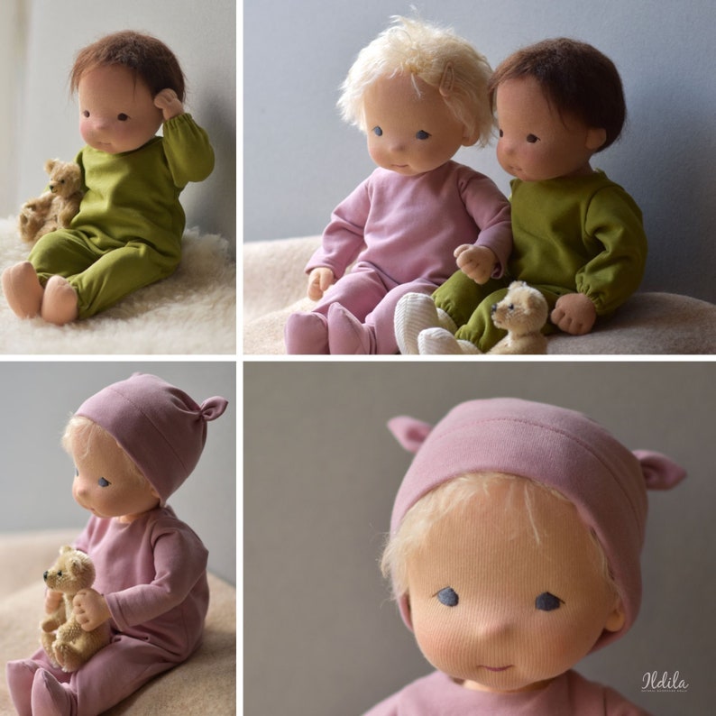 May include: Three handmade cloth dolls wearing different colored outfits. The dolls are sitting on a light brown surface. Each doll is holding a small stuffed animal.