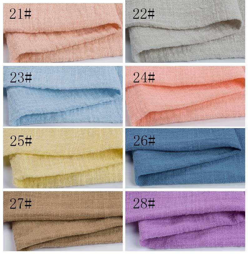 May include: A grid of eight fabric swatches with a textured, woven appearance. Each swatch is labeled with a number from 21# to 28#. The colors include light pink, light gray, light blue, peach, pale yellow, medium blue, tan, and light purple.