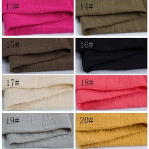 May include: A collection of eight fabric swatches labeled 13# through 20#, featuring a textured weave in various solid colors including hot pink, olive green, dark brown, black, cream, bright red, light gray, and mustard yellow.