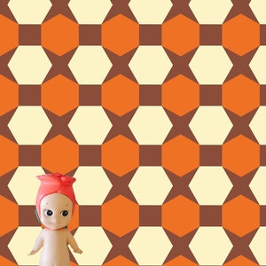 May include: A small, nude-colored doll with a red rose head and green leaves stands in front of a geometric pattern of orange and brown hexagons on a cream background.