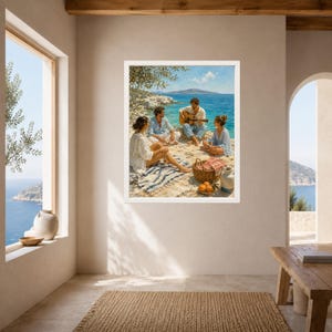 May include: A framed wall art print depicting a coastal scene with three people sitting on a rocky shore by the blue sea. One person plays an acoustic guitar while others relax on a striped blanket near a woven basket and a ceramic jug.