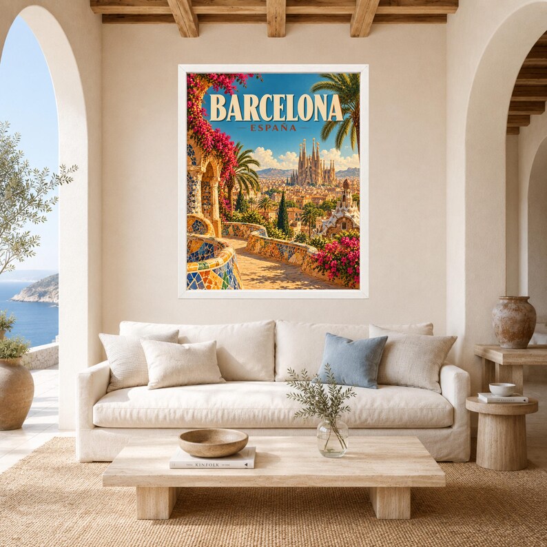 May include: A framed travel poster featuring a vibrant illustration of Barcelona, Espa&ntilde;a, with the Sagrada Familia in the distance, colorful mosaic tile walls, bright pink bougainvillea flowers, and palm trees under a clear blue sky.