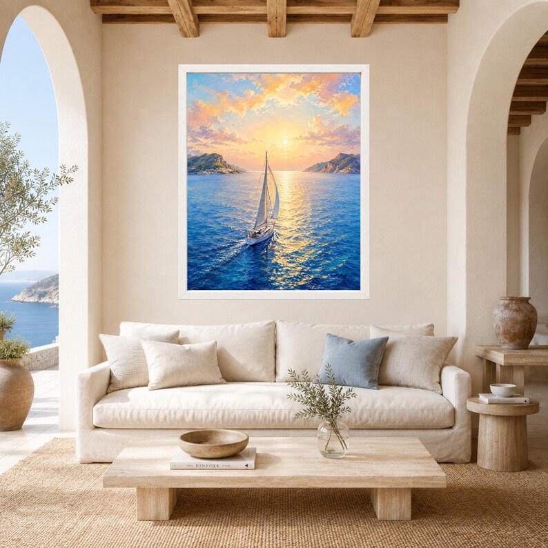 May include: A framed wall art print depicting a sailboat on deep blue water during a golden sunset. The sky is filled with soft orange and yellow clouds, and the sun reflects brightly on the sea surface, creating a path of light toward the horizon.