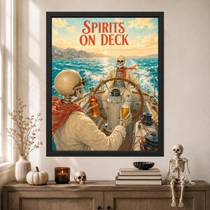 May include: A framed wall art print titled Spirits on Deck featuring two skeletons on a boat at sea. One skeleton steers the vessel while the other holds a bottle. The scene includes a sunset, blue water, and orange scarves. The print is in a black frame.