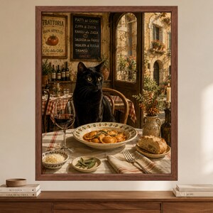 May include: A framed wall art print depicting a black cat sitting at a table in an Italian trattoria. The table features a bowl of ravioli, a glass of red wine, bread, and a small bowl of cheese. A chalkboard menu lists food items in the background.
