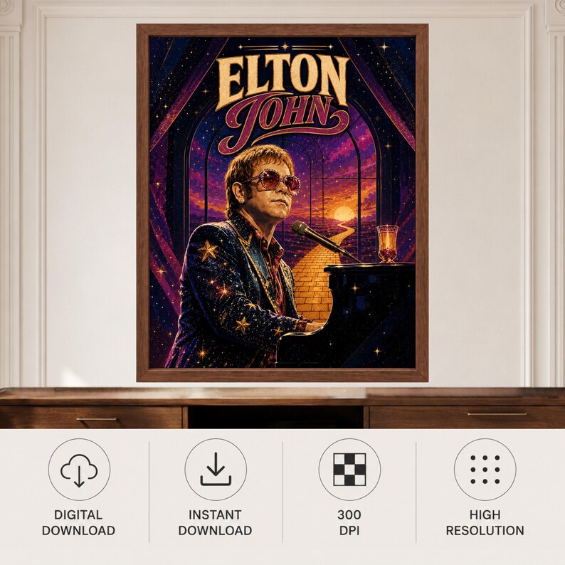 May include: A framed wall art print featuring Elton John wearing star-patterned clothing and sunglasses, seated at a piano. The background displays a yellow brick road leading toward a sunset under a starry sky, with the text ELTON JOHN at the top.