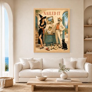 May include: A framed wall art print titled NAILED IT featuring a witch in a black dress and a skeleton in a beige suit standing in a room with tools, a toolbox, and a black cat. The scene depicts a home renovation project with framed pictures.