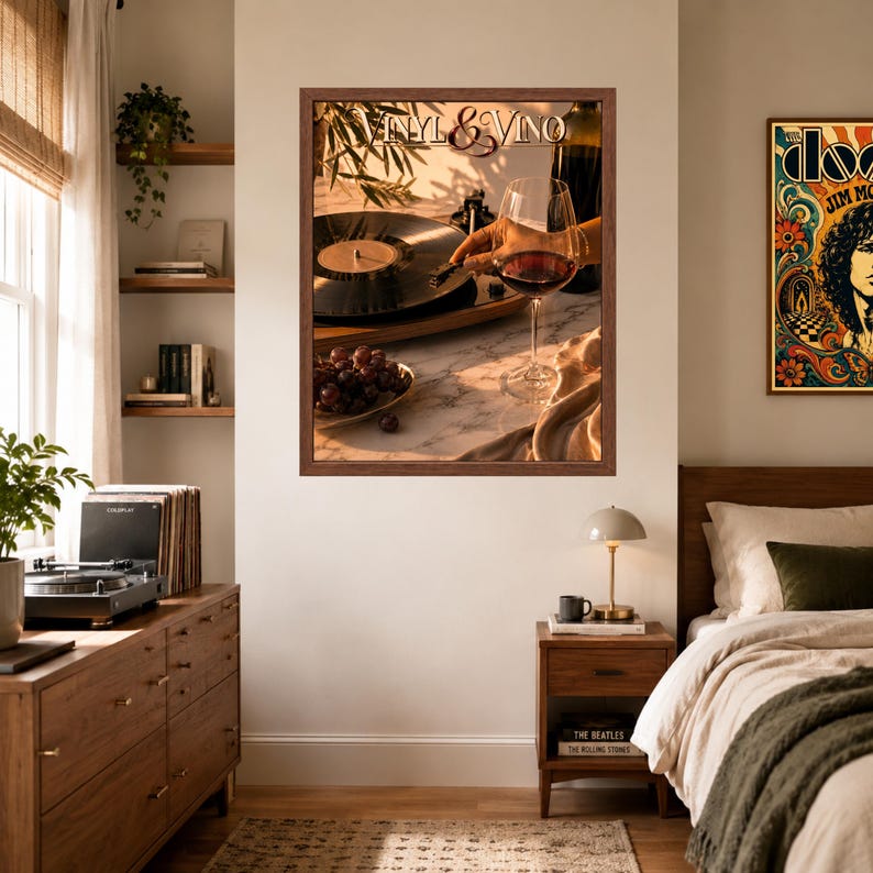 May include: A framed wall art print titled Vinyl & Vino featuring a black vinyl record on a turntable, a glass of red wine, and a small bowl of grapes on a marble surface. The warm lighting highlights the scene with a dark brown wooden frame.